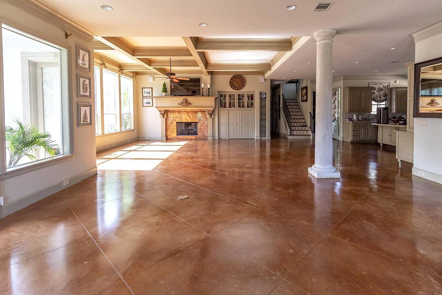 An acid stained concrete living room floor