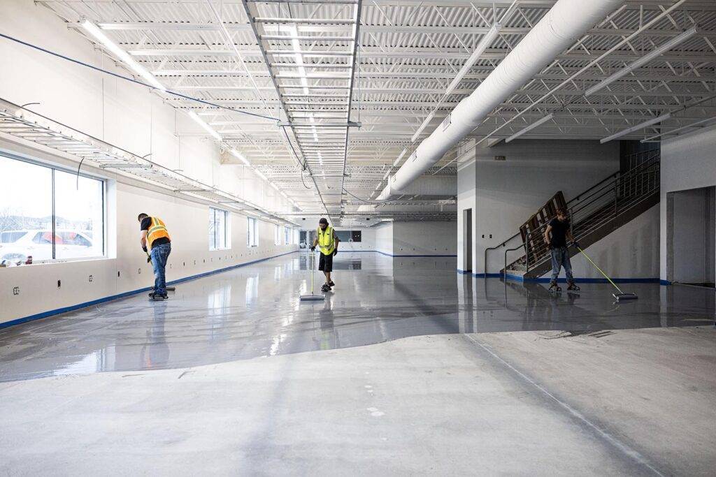 Workers installing an ESD epoxy floor in Dallas, Texas